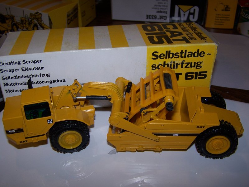 Cat 615 elevator scraper